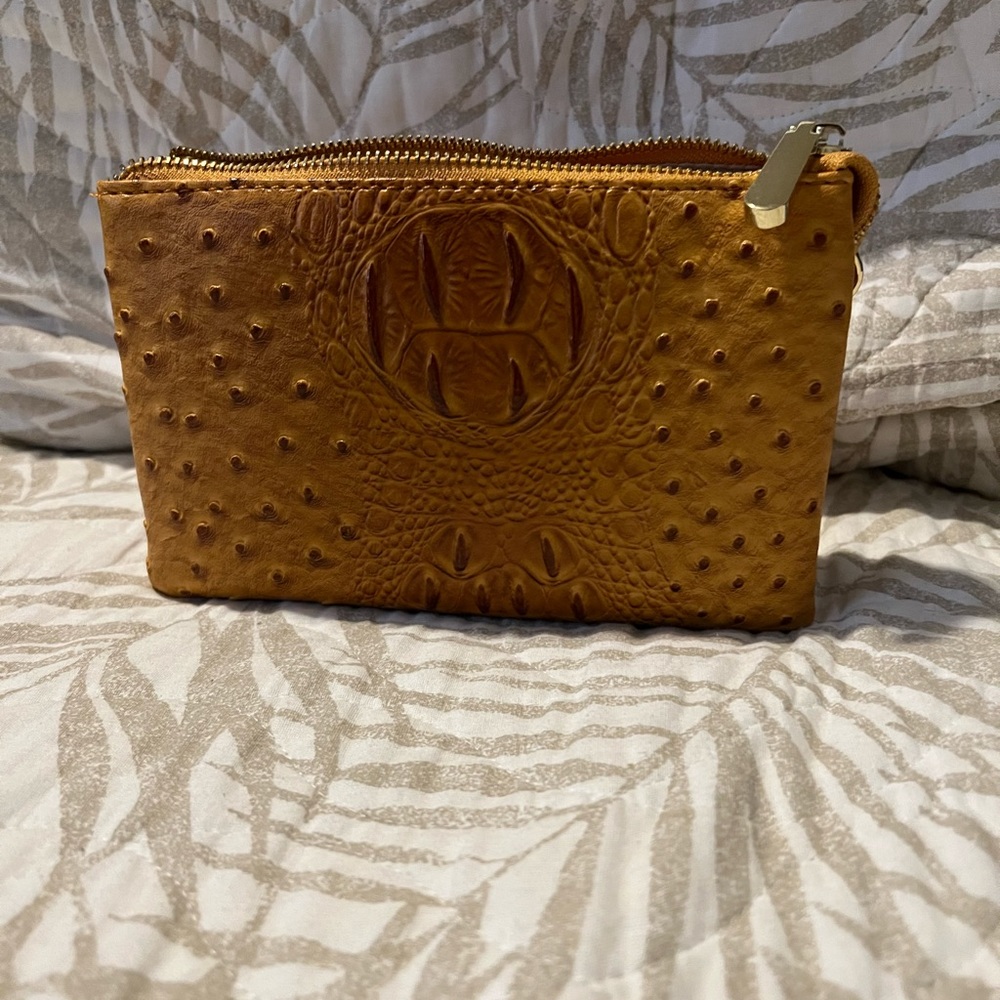Dark orange /brown clutch with strap